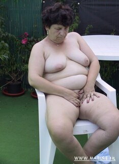 Mama Playing With Her Toys In The Garden
