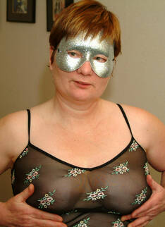 This Mature Masked Marauder Loves Her Toys
