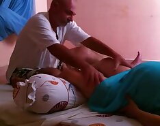 Pregnant woman getting leg massage