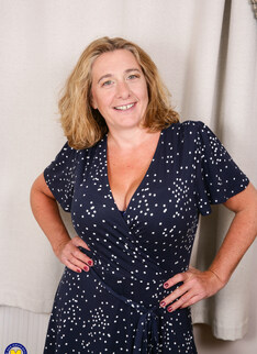 Naughty Camilla playing with her big natural tits