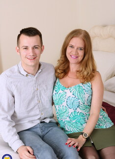 Big breasted British housewife having fun with her toy boy
