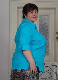Huge breasted mature lady getting naughty