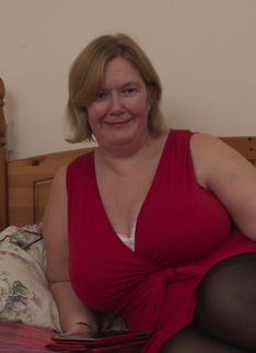 Large British mature lady with big natural tits getting dirty