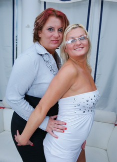 Two lesbian housewives get ready for playtime