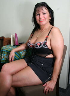 Brunette Housewife Playing With Her Pink Toy