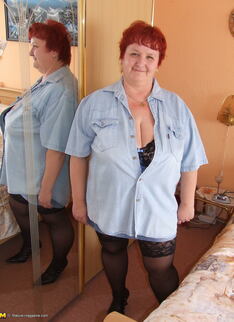 Red Housewife Taking Off All Her Clothes