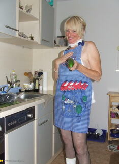 Naughty Housewife Gets Frisky In The Kitchen