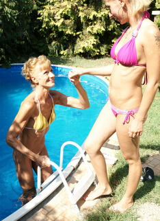 Two Old And Young Lesbians Making Out At The Pool