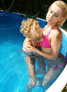 Two Old And Young Lesbians Making Out At The Pool