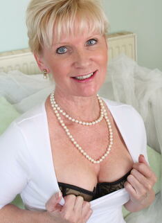 Naughty Blonde Housewife Getting Naked
