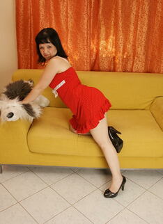 This Horny Housewife Shows Off On Her Couch
