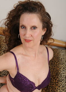 Mature Babe Playing With A Dildo