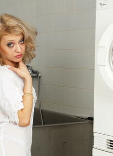 Blonde Mature Slut Doing Her Laundry