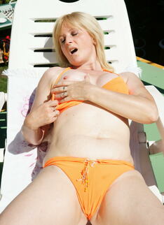 Horny Mature Slut Playing With Herself In The Sun