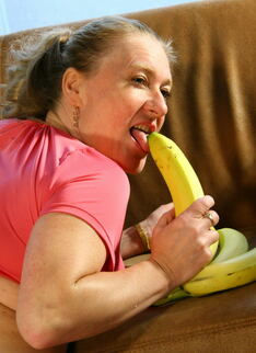 Naughty Housewife Playing With A Banana