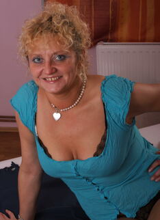 Naughty Housewife Showing Off Her Goods