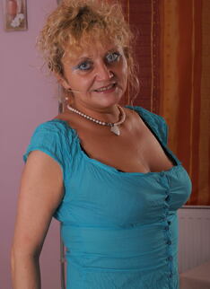 Naughty Housewife Showing Off Her Goods
