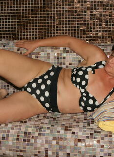 Mature Ladies Bathing And Relaxing In A Sauna