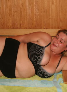 Mature Ladies Bathing And Relaxing In A Sauna