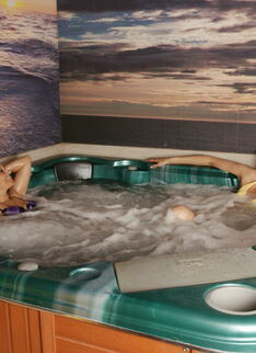 Mature Women Relaxing In A Sauna
