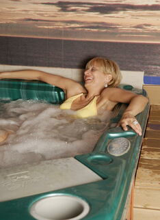 Mature Women Relaxing In A Sauna