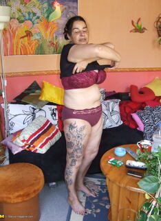 Tatooed Mature Slut Showing Her Pussy