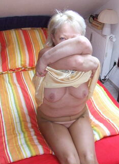 Blonde Mature Slut Playing With Herself