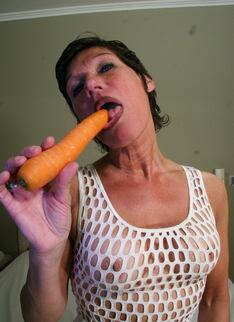 Kinky Mature Slut Getting Wet With A Carrot