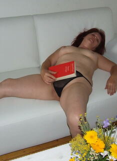 Naughty Housewife Getting Naked In The Livingroom