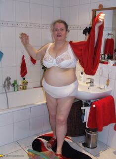 Big Mama Playing With Whipped Cream In The Tub