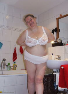 Big Mama Playing With Whipped Cream In The Tub