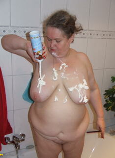 Big Mama Playing With Whipped Cream In The Tub