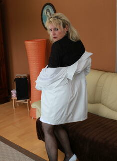 Horny Blonde Housewife Getting Naughty On The Couch