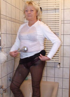 Blonde Housewife Taking A Kinky Shower