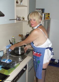 Naughty Housewife Gets Frisky In The Kitchen