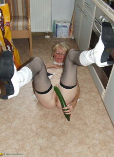 Naughty Housewife Gets Frisky In The Kitchen