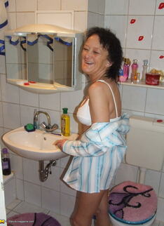 Mature Slut Caught Changing Clothes In The Bathroom