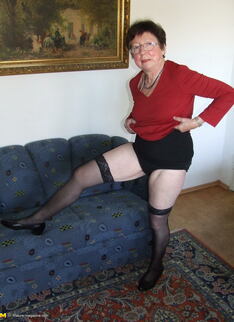 Kinky Housewife Playing With Beads On Her Couch