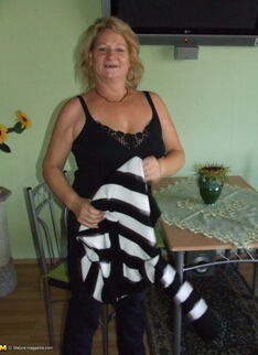 Naked Mature Mama Strolling Through The Hallway