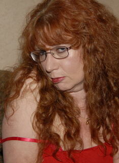 This Red Mature Nympho Loves To Get Down On Cock