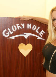 Hot Milf Getting Caught Sucking Through The Gloryhole