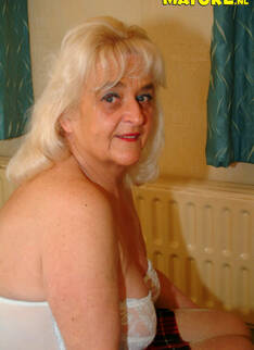 Big Titted Granny Showing Off Her Body