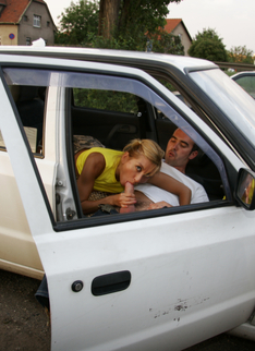 Hot Milf Sucking Two Guys Off On A Parking Lot