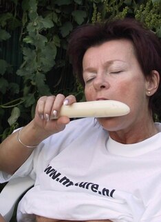 Mature Slut Playing With Herself In The Garden