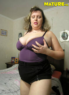Big Titted Mature Slut Showing Her Wet Cooch