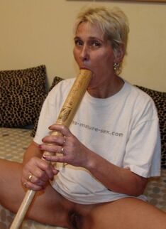 Horny Mature Slag Fucking Herself With A Baseballbat