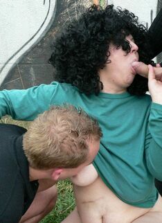 Big Titted Mature Slut Sucking Two Cocks In The Open Air