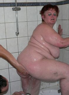 Horny Tubby Mature Slut Playing In The Shower