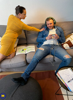 Mature.nl - Horny MILF tries to cure her stepsons gaming addiction