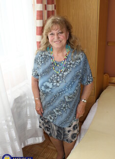 Katerina is a curvy 73 year old granny with big saggy tits who fucks the young man next door